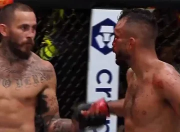 Der Krieger von UFC ist noch gut, verlängert seine Hand auf Ihre Gegner