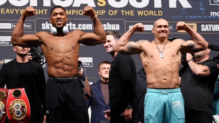 What does this mean, is this photograph of Joshua warning that he will defeat Ukrainian boxer Usyck?