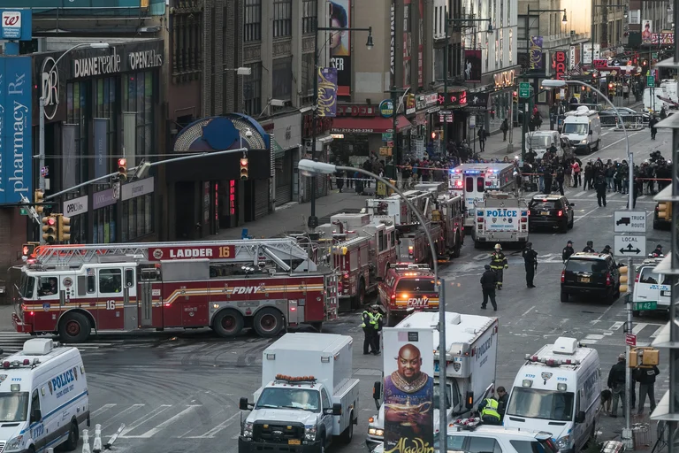 A New York subway attack, an unbroken vehicle, fugitive attacker