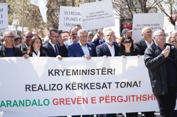 With Nundman Jasharain in front of the great union protest: Event Through Picture