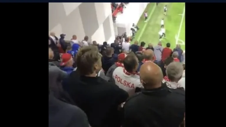 Neue Bilder zeigen polnischen Fans, die vor dem Vorfall Albaner provozieren, waren die ersten, um Flaschen zu gießen