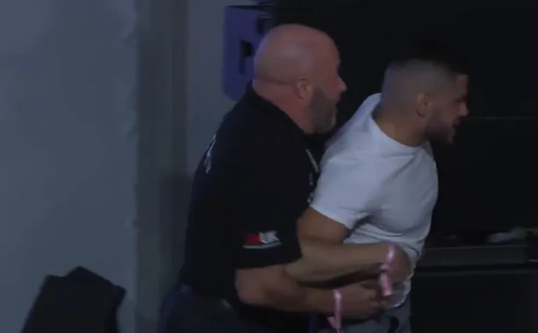 Albanian boxer swears and tries to beat up his opponent during the conference, guard shows him the country (Video)