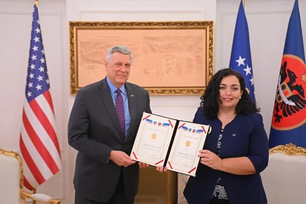 Osman meets farewell with Ambassador Costnett, decorating it at a “Dr order. Ibrahim Rugova”