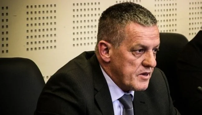 Was dismissed from the position of director of the Law Medicine Institute, Gerjaliu