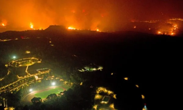 Drone captures frightening images: Flames surround dwellings, approaching archeology site
