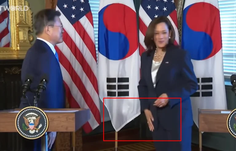 Kamala Harris löscht seine Hand nach dem Gruß an den südkoreanischen Präsidenten