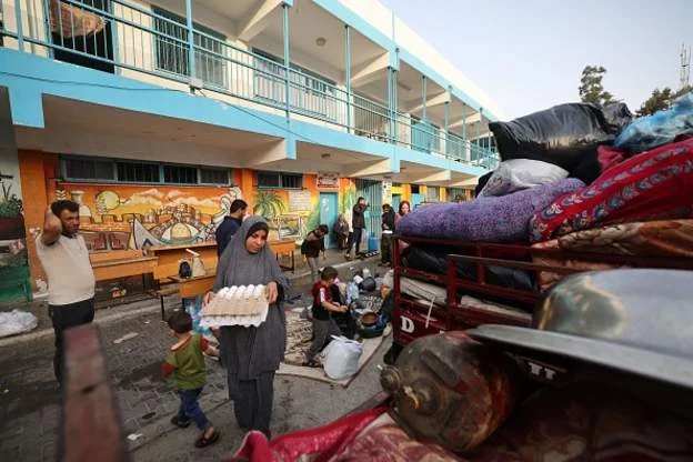 I palestinesi tornano alle loro case a Gaza