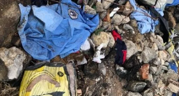 Kosovo Police Unit among waste near Sitnica River