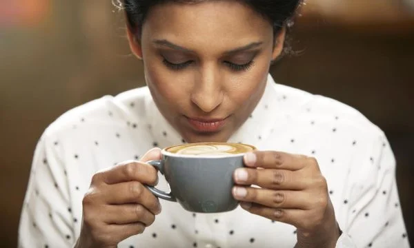 Coffee at the bar, but with your cup