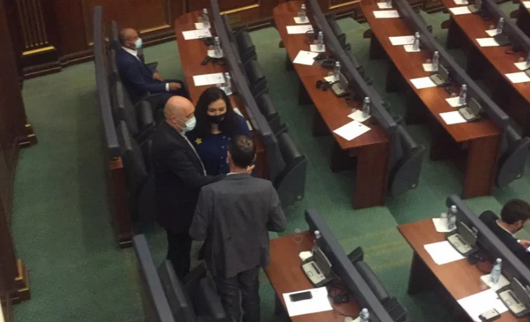 After voting, Adem Hoxha “ssel” with Vjosa Osman