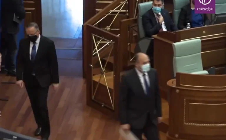LAST LAST LAST: Enver Hoxhaj and Bedri Hamza enter the hall