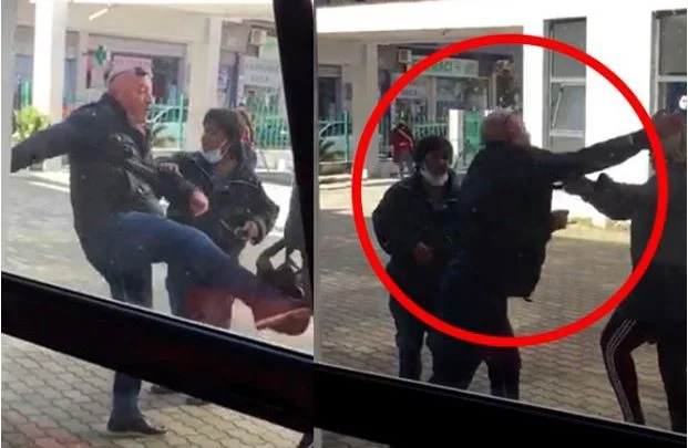 Embarrassed: Geschäftsleute in Fier Kick und Schlagfrauen vor dem Krankenhaus