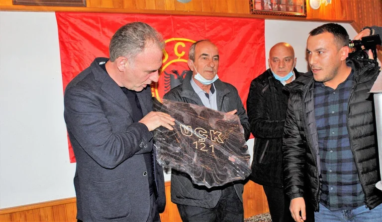 Maralia and Dragobil line up with Fatmir Limaj and the liberation case