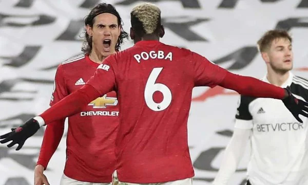 United vince per rovesciamento, ottiene Premier League leader