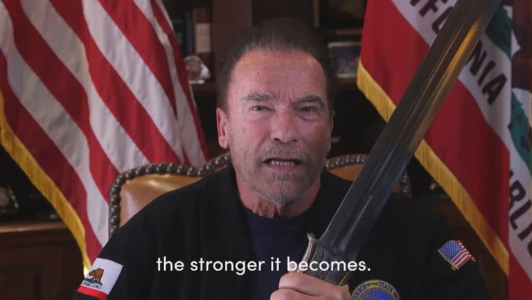 With sword in hand, Schwarzenegger compares Trump to Hitler