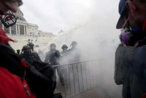Police also use tear gas to disperse protesters at Capitol Hill
