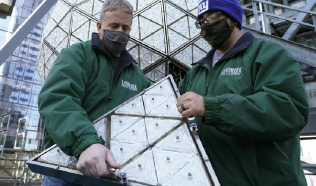 Workers install 192 crystals at New Year's Ball in Times Square