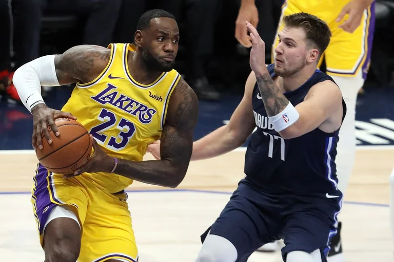 Lakers find first victory, but Doncic shines