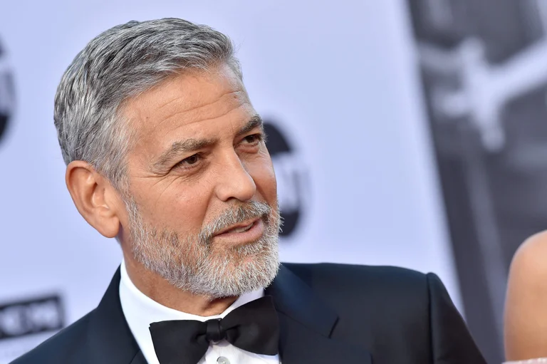 The most sexy male in the world, George Clooney, is declared the year's icon by the world's famous magazine.