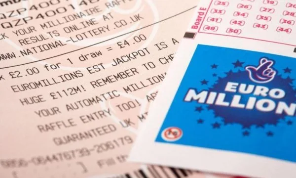 The most fortunate man in the world: He accidentally bought an extra ticket, won $2 million.