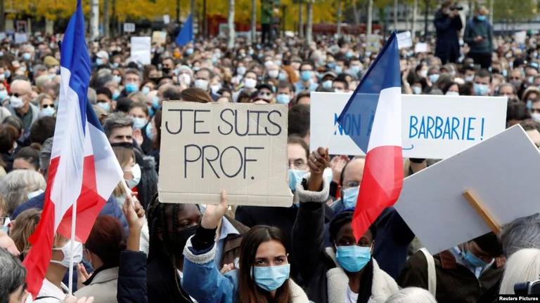 Paris honors the slain teacher, shock, and revolt after execution