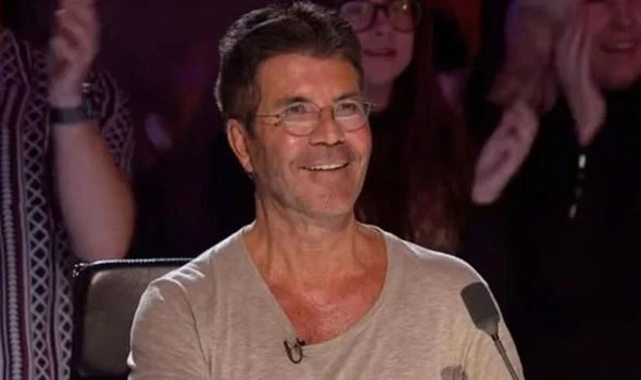Simon appears for the first time since he fell off his electric bike.