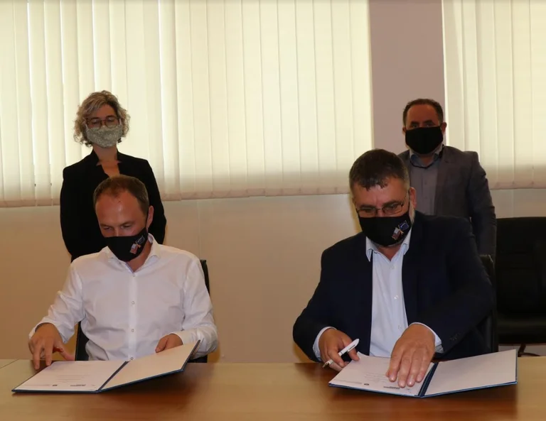 Agreeance Agreement Signed between MEA and FPC for Air Quality