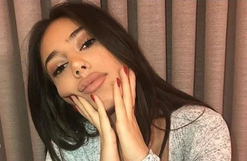 La fille de Lutfi Haziri reçoit l'attention avec la pose chaude