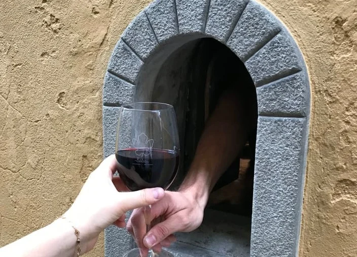 The wine windows that were used in Toscan during the plague are back today to this day because of the coronary