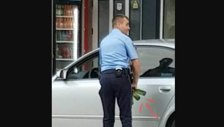 A policeman with no mask during work hours enters the store and buys beer