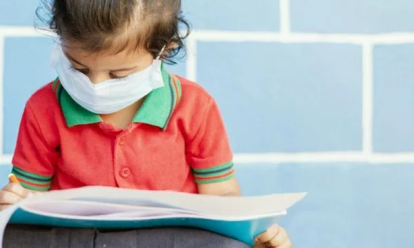 How do we recognize the symptoms of Covid-19 in children based on the advice of the pediatricians