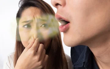 Rimuovere il respiro sgradevole, con alcuni lievi cambiamenti nella vostra routine