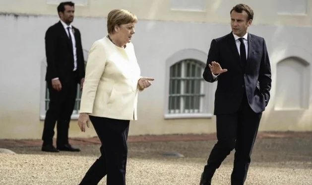 Merkel rencontre Macron avant de prendre la présidence de l'UE