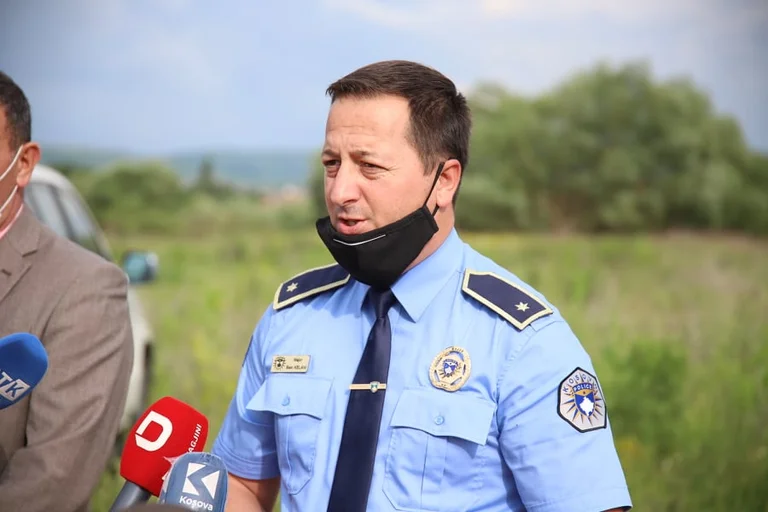 The second child is brought out of the water hole in Milosevo dead