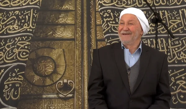 Myezin who's been calling the esan at the mosque for 70 years