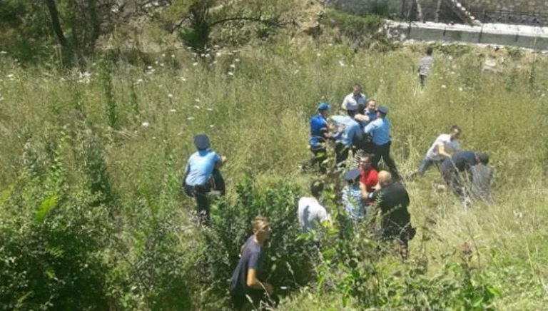 Men and women clash with strong tools after a dispute over property in Istog