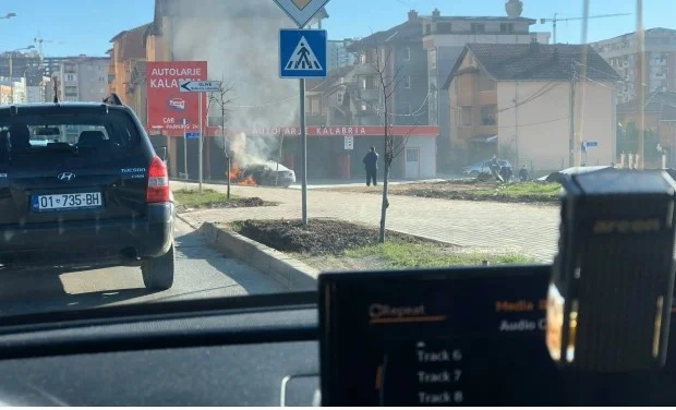 A car burns in Pristina