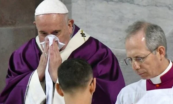 The pope in poor health, coughing interrupted his speech