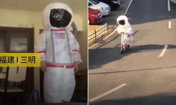 Habillé comme astronaute pour la peur du koronavirus (Photo)