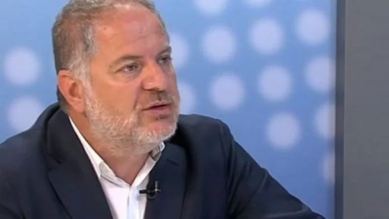 How will Green act if Kurt doesn't hear about the tax, according to journalist Baton Haxhiu
