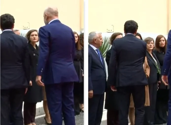 Dardan Molliq's wife comes out to welcome Albin Kurti during his visit to Tirana