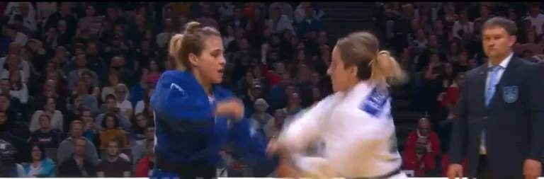 Image from the heroic moment Distria Krasniqi slammed the famous Geuffried to win the gold