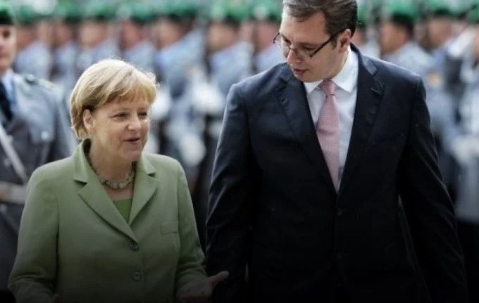 Vuciq and Merkel to meet this month