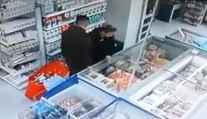 He tries to run, toss his wife to the ground, and quickly leaves