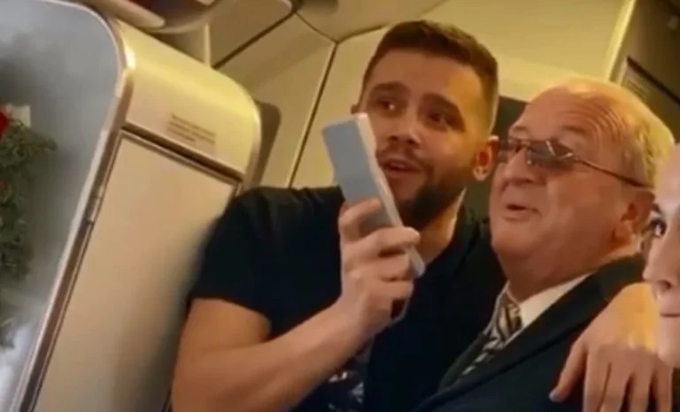 Flori Mumese and Luan Zegu perform on the plane