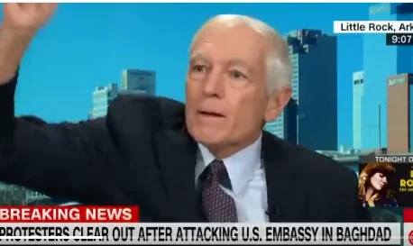 General Wesley Clark throws his phone during live CNN interview
