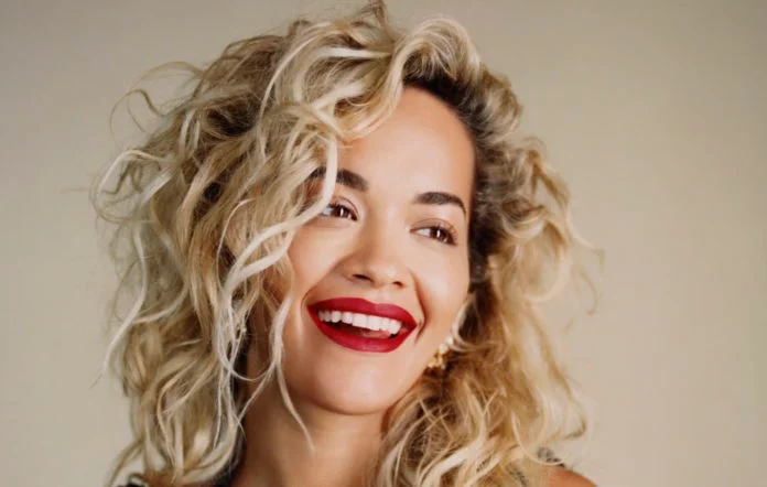 Rita Ora shopping, striking out her interesting sneakers